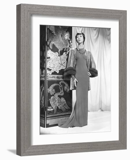 Anna May Wong in an Edith Head-Designed Crepe Dinner Gown with a Jacket of Emerald-null-Framed Photo
