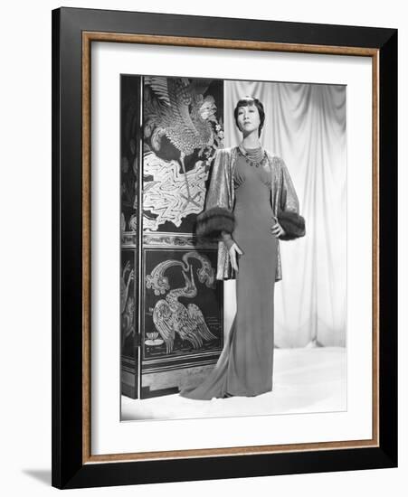 Anna May Wong in an Edith Head-Designed Crepe Dinner Gown with a Jacket of Emerald-null-Framed Photo