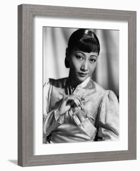 Anna May Wong, in an Orange Nanking Brocade Robe with Sandalwood Fastenings, 1937-null-Framed Photo