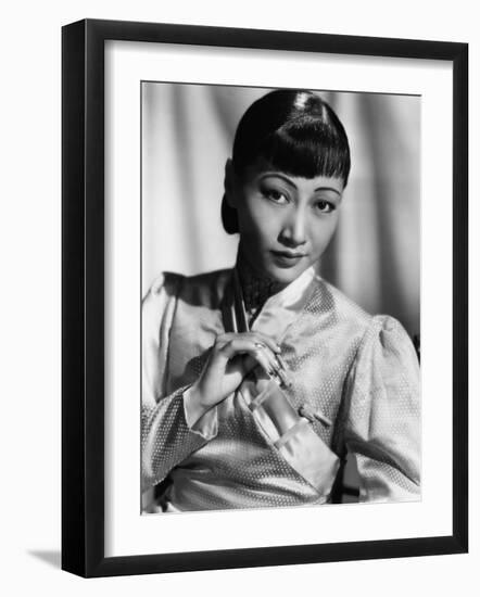 Anna May Wong, in an Orange Nanking Brocade Robe with Sandalwood Fastenings, 1937-null-Framed Photo