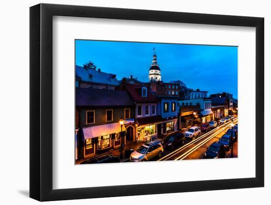 ANNAPOLIS MARYLAND - Maryland State Capitol is seen at dusk above Main Street Annapolis, Maryland-null-Framed Photographic Print