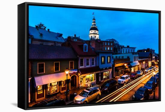 ANNAPOLIS MARYLAND - Maryland State Capitol is seen at dusk above Main Street Annapolis, Maryland-null-Framed Stretched Canvas