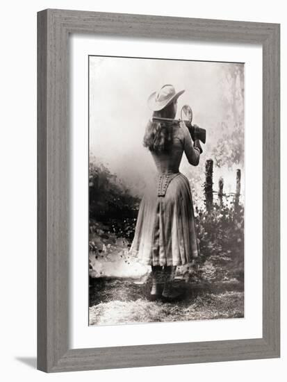 Annie Oakley Shooting over Shoulder-null-Framed Photographic Print