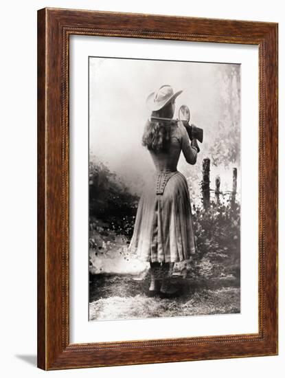 Annie Oakley Shooting over Shoulder-null-Framed Photographic Print