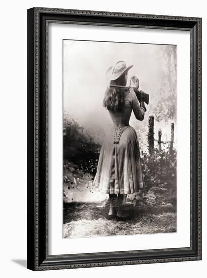 Annie Oakley Shooting over Shoulder-null-Framed Photographic Print