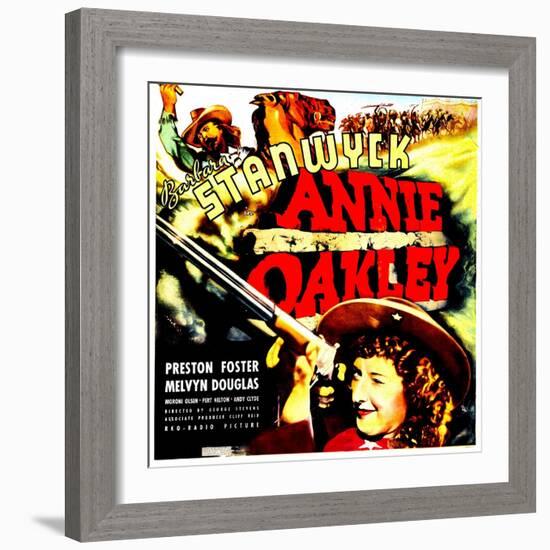 ANNIE OAKLEY, top: Moroni Olsen, bottom: Barbara Stanwyck on jumbo window card, 1935-null-Framed Art Print