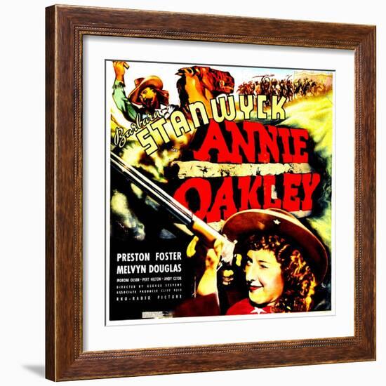 ANNIE OAKLEY, top: Moroni Olsen, bottom: Barbara Stanwyck on jumbo window card, 1935-null-Framed Art Print