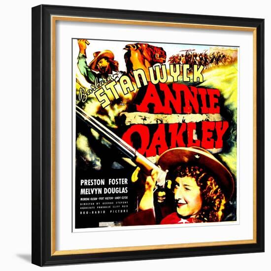 ANNIE OAKLEY, top: Moroni Olsen, bottom: Barbara Stanwyck on jumbo window card, 1935-null-Framed Art Print