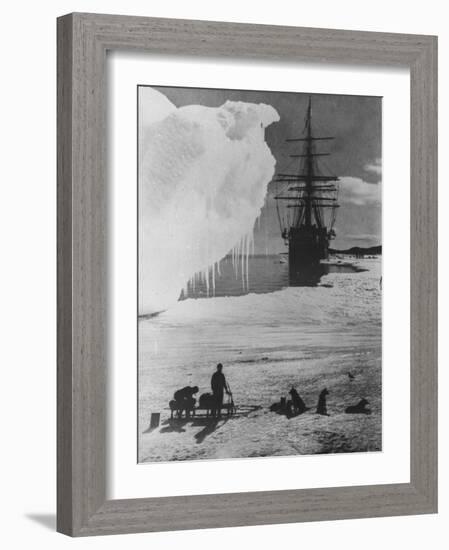 Antarctic Expedition of Robert Scott on Ice with Ship "Terra Nova" Anchored in Background-null-Framed Photographic Print