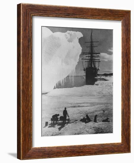 Antarctic Expedition of Robert Scott on Ice with Ship "Terra Nova" Anchored in Background-null-Framed Photographic Print