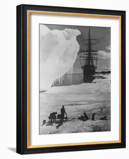 Antarctic Expedition of Robert Scott on Ice with Ship "Terra Nova" Anchored in Background-null-Framed Photographic Print