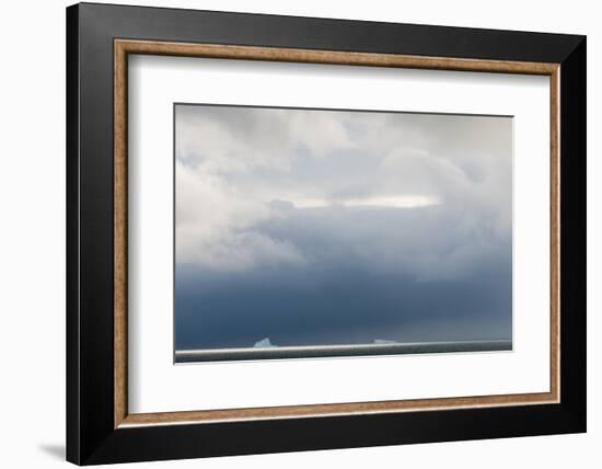 Antarctica. Bransfield Strait. Iceberg under Stormy Skies-Inger Hogstrom-Framed Photographic Print