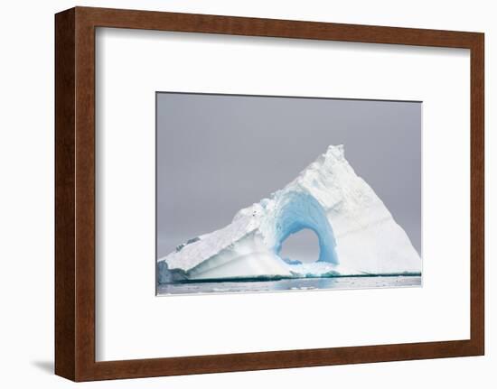 Antarctica. Charlotte Bay. Giant Iceberg with a Hole-Inger Hogstrom-Framed Photographic Print