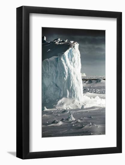 Antarctica. Iceberg at Sunrise Surrounded by Sea Ice-Janet Muir-Framed Photographic Print