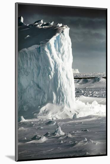 Antarctica. Iceberg at Sunrise Surrounded by Sea Ice-Janet Muir-Mounted Photographic Print