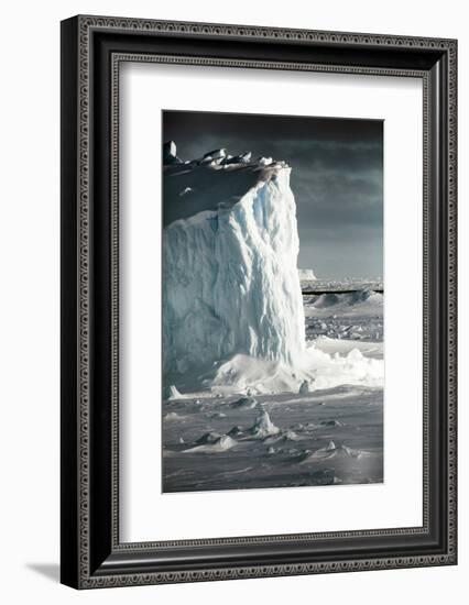 Antarctica. Iceberg at Sunrise Surrounded by Sea Ice-Janet Muir-Framed Photographic Print