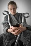 Person on Crutches Texting-Anthony West-Framed Photographic Print