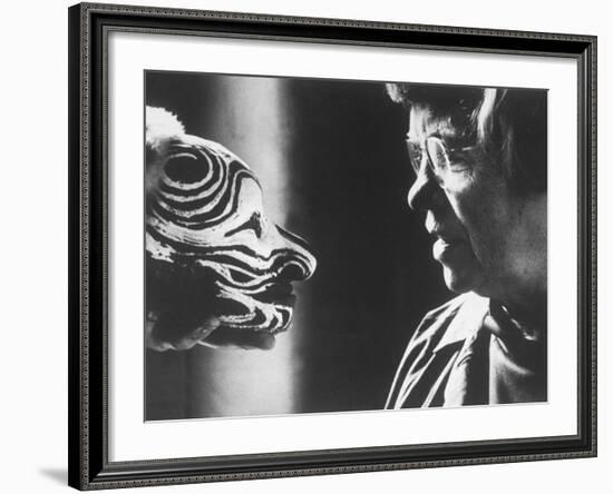 Anthropologist Dr. Margaret Mead Studying a Decorated Tchambul Skull-John Loengard-Framed Premium Photographic Print