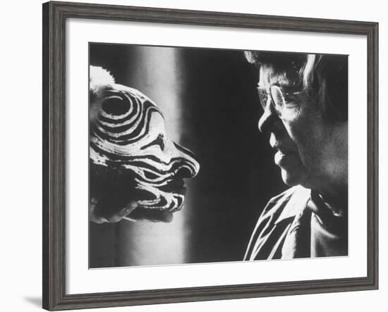 Anthropologist Dr. Margaret Mead Studying a Decorated Tchambul Skull-John Loengard-Framed Premium Photographic Print
