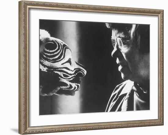 Anthropologist Dr. Margaret Mead Studying a Decorated Tchambul Skull-John Loengard-Framed Premium Photographic Print