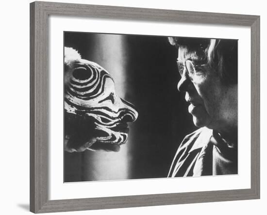 Anthropologist Dr. Margaret Mead Studying a Decorated Tchambul Skull-John Loengard-Framed Premium Photographic Print