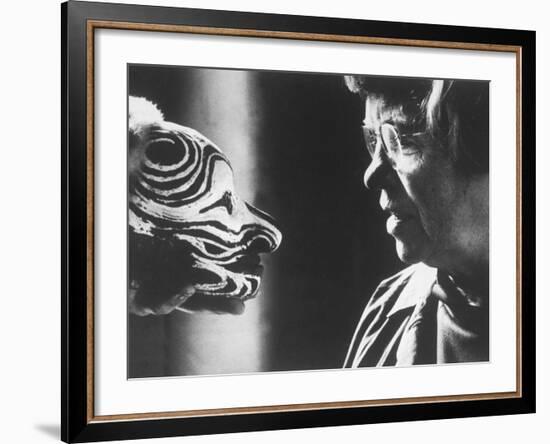 Anthropologist Dr. Margaret Mead Studying a Decorated Tchambul Skull-John Loengard-Framed Premium Photographic Print