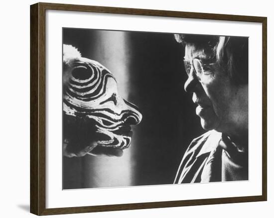 Anthropologist Dr. Margaret Mead Studying a Decorated Tchambul Skull-John Loengard-Framed Premium Photographic Print