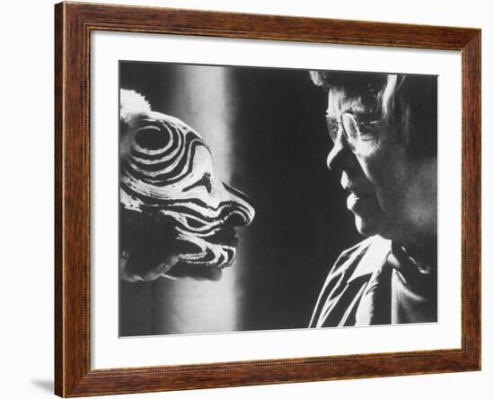 Anthropologist Dr. Margaret Mead Studying a Decorated Tchambul Skull-John Loengard-Framed Premium Photographic Print