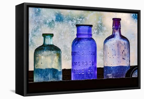 Antique colored bottles in window, Prescott National Forest, Jerome, Arizona-Adam Jones-Framed Premier Image Canvas