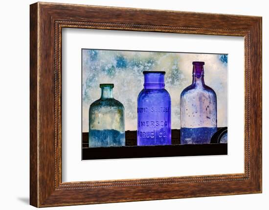 Antique colored bottles in window, Prescott National Forest, Jerome, Arizona-Adam Jones-Framed Photographic Print