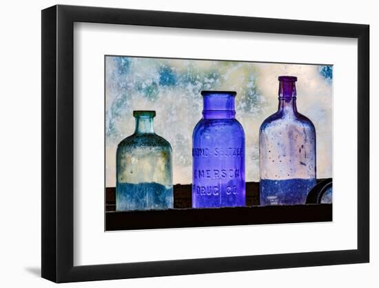 Antique colored bottles in window, Prescott National Forest, Jerome, Arizona-Adam Jones-Framed Photographic Print