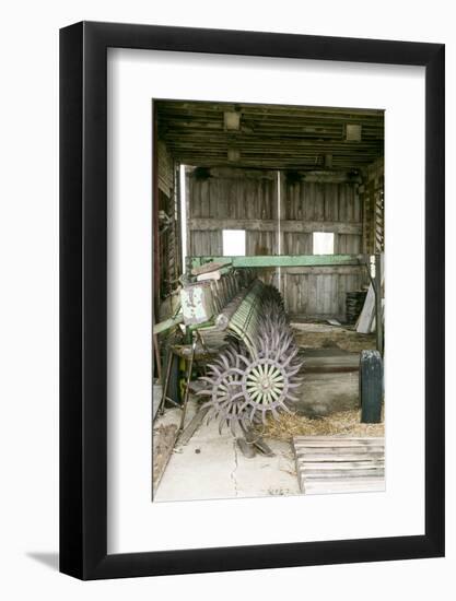 Antique Plow in an Old Wooden Barn, Joliet, Illinois, USA. Route 66-Julien McRoberts-Framed Photographic Print