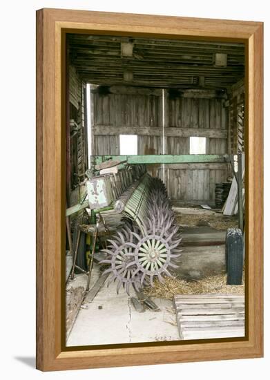 Antique Plow in an Old Wooden Barn, Joliet, Illinois, USA. Route 66-Julien McRoberts-Framed Premier Image Canvas