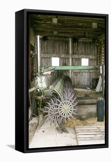 Antique Plow in an Old Wooden Barn, Joliet, Illinois, USA. Route 66-Julien McRoberts-Framed Premier Image Canvas