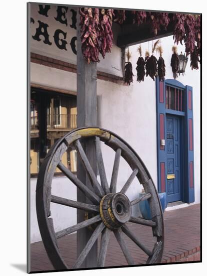 Antique wagon wheel, Old Town Albuquerque, New Mexico-Jerry Ginsberg-Mounted Photographic Print