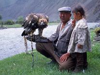 Mongolia, Kasakh Hunter with Eagle by the Khovd River, with a Small Child-Antonia Tozer-Framed Photographic Print