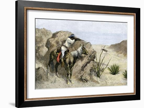 Apache Warrior Ambushing a Covered Wagon in the Southwest, c.1800-null-Framed Giclee Print