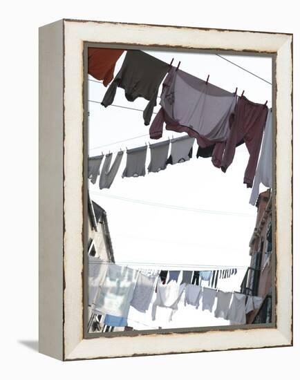 Apartment Buildings with Laundry Hanging Out to Dry on Clothes Line-null-Framed Premier Image Canvas