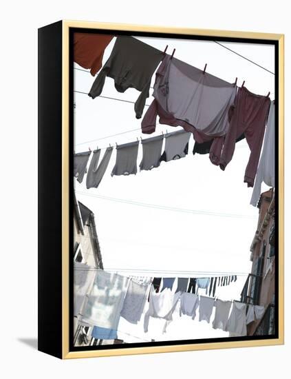 Apartment Buildings with Laundry Hanging Out to Dry on Clothes Line-null-Framed Premier Image Canvas