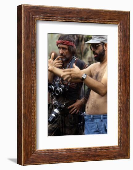 APOCALYPSE NOW, 1979 directed by FRANCIS FORD COPPOLA On the set, Francis Ford Coppola directs Denn-null-Framed Photo