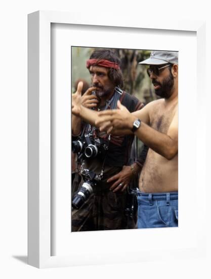 APOCALYPSE NOW, 1979 directed by FRANCIS FORD COPPOLA On the set, Francis Ford Coppola directs Denn-null-Framed Photo
