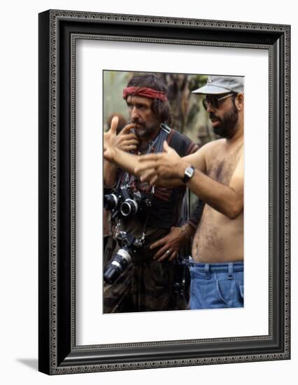 APOCALYPSE NOW, 1979 directed by FRANCIS FORD COPPOLA On the set, Francis Ford Coppola directs Denn-null-Framed Photo