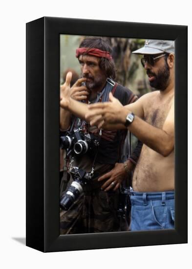 APOCALYPSE NOW, 1979 directed by FRANCIS FORD COPPOLA On the set, Francis Ford Coppola directs Denn-null-Framed Stretched Canvas