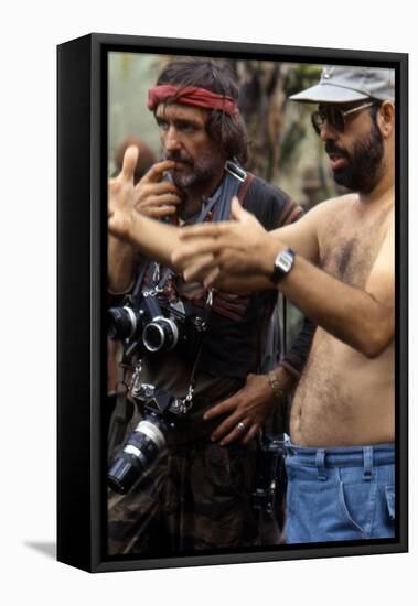 APOCALYPSE NOW, 1979 directed by FRANCIS FORD COPPOLA On the set, Francis Ford Coppola directs Denn-null-Framed Stretched Canvas