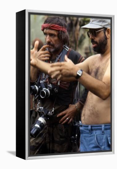 APOCALYPSE NOW, 1979 directed by FRANCIS FORD COPPOLA On the set, Francis Ford Coppola directs Denn-null-Framed Stretched Canvas