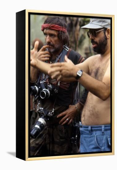 APOCALYPSE NOW, 1979 directed by FRANCIS FORD COPPOLA On the set, Francis Ford Coppola directs Denn-null-Framed Stretched Canvas