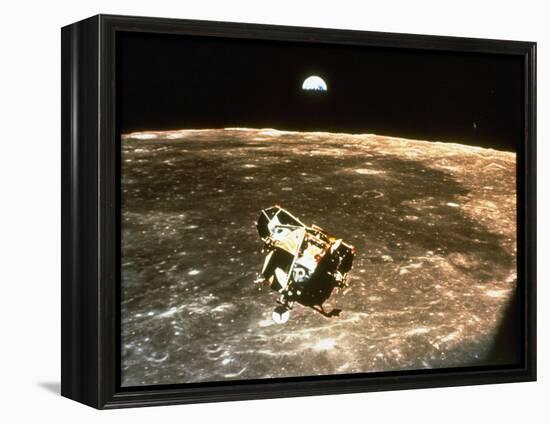 Apollo 11's Lunar Module Flying over the Moon with Earth in the Bkgrd-null-Framed Premier Image Canvas