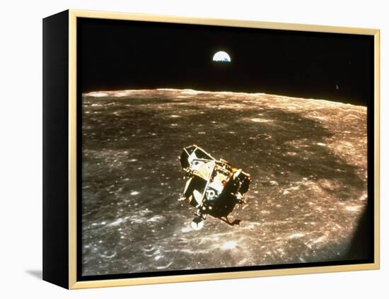 Apollo 11's Lunar Module Flying over the Moon with Earth in the Bkgrd-null-Framed Premier Image Canvas