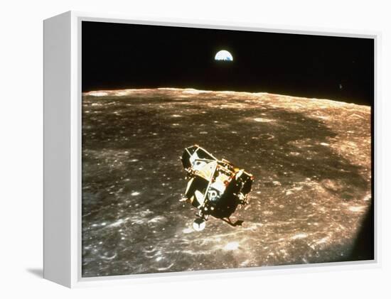 Apollo 11's Lunar Module Flying over the Moon with Earth in the Bkgrd-null-Framed Premier Image Canvas