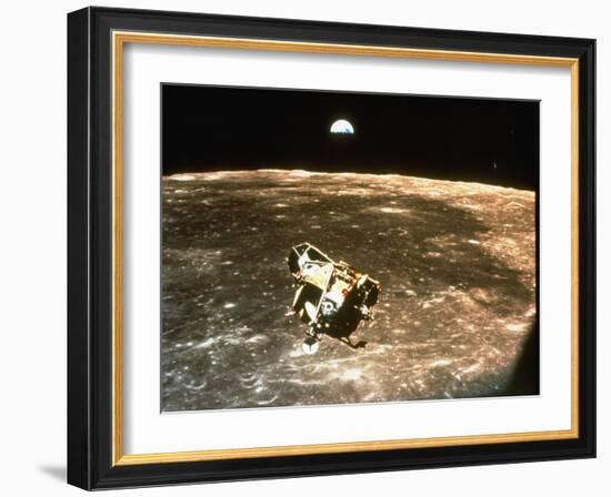 Apollo 11's Lunar Module Flying over the Moon with Earth in the Bkgrd-null-Framed Photographic Print